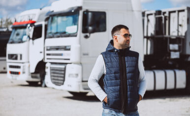 Man driver of the lorry in a logistic company